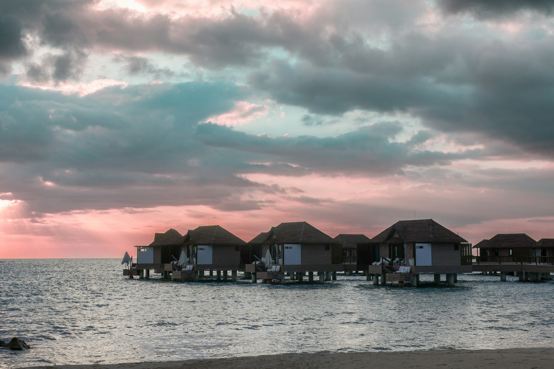 Overwater cabanas along the Jamaican coastline
